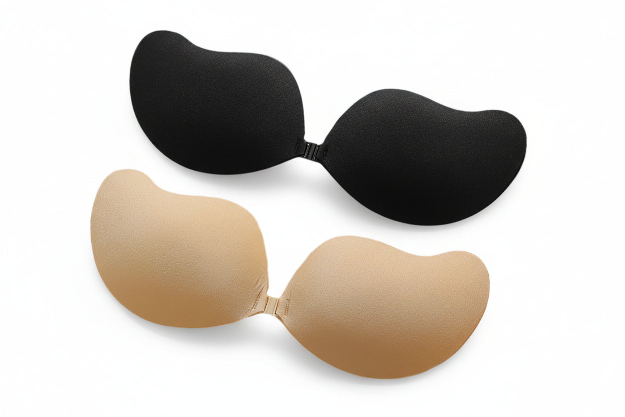 Black and beige strapless bras on a white background