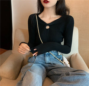 Autumn and winter new knitted sweater women's heart machine hollow bottoming shirt design sense with V - neck long - sleeved slim top - Negative Apparel