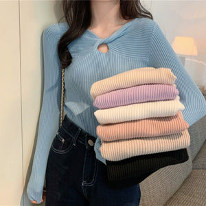 Autumn and winter new knitted sweater women's heart machine hollow bottoming shirt design sense with V - neck long - sleeved slim top - Negative Apparel