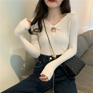 Autumn and winter new knitted sweater women's heart machine hollow bottoming shirt design sense with V - neck long - sleeved slim top - Negative Apparel