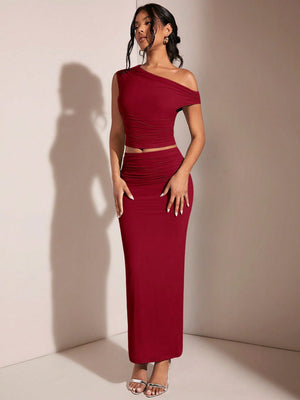 BAE Women's Asymmetric Neck Asymmetrical Neck Top And Pleated Elegant Skirt Set - Negative Apparel