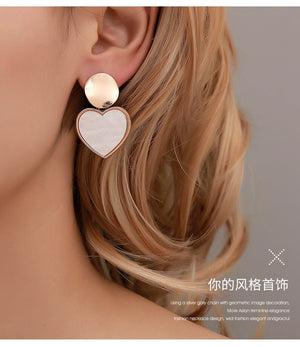 Korean version of small fresh earrings simple geometric heart earrings personality hollow disc alloy pendant girl heart earrings - Negative Apparel