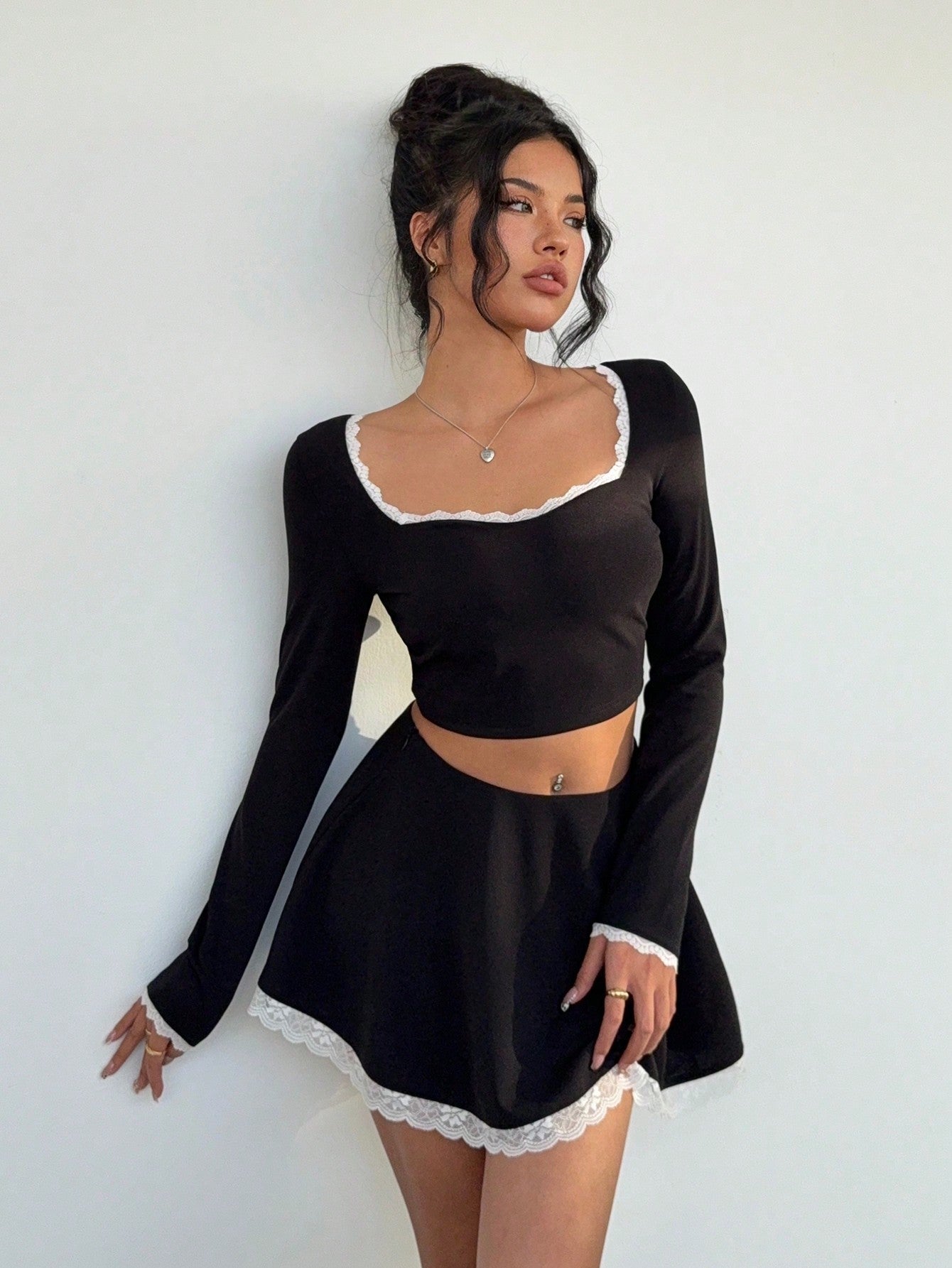 Modern Lace Patchwork Crew Neck Long Sleeve Fitted Black T-Shirt + Low - Waist Lace Patchwork Flare Hem Skirt - Negative Apparel
