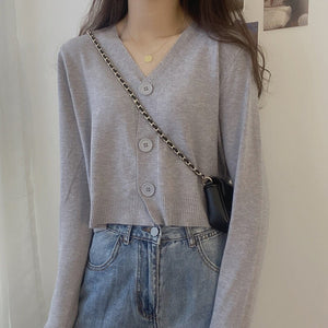 V - neck sweater women's 2022 autumn and winter new outer white top cardigan long - sleeved short knitted cardigan wholesale - Negative Apparel