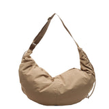 Pleated Strap Crescent Bag