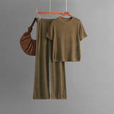 Summer casual fashion versatile round neck solid color short-sleeved loose knitted hollow wide-leg pants two-piece set