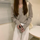 Spring and Autumn 2022 new V-neck bottoming shirt with knitted sweater inside women's loose design sense niche top high sense