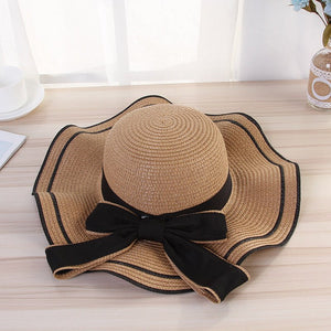 Summer wide brim hat wavy edge bow straw hat ladies beach sunshade wide brim hat manufacturers wholesale - Negative Apparel