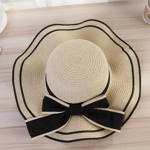 Summer wide brim hat wavy edge bow straw hat ladies beach sunshade wide brim hat manufacturers wholesale - Negative Apparel
