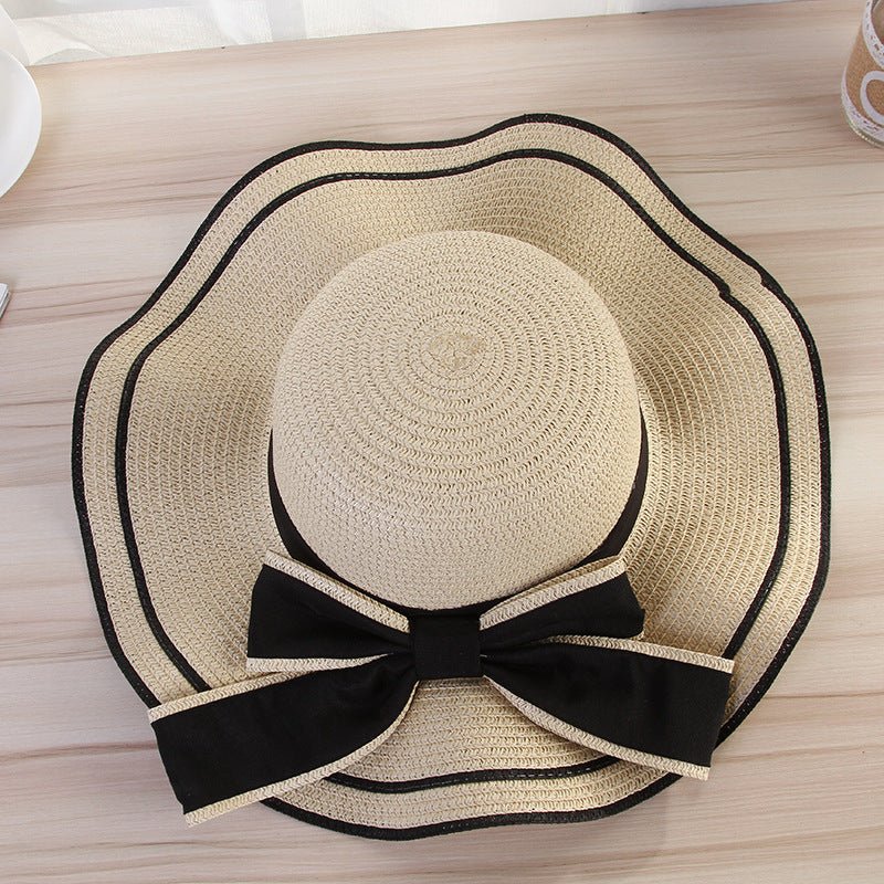 Summer wide brim hat wavy edge bow straw hat ladies beach sunshade wide brim hat manufacturers wholesale - Negative Apparel