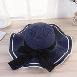 Summer wide brim hat wavy edge bow straw hat ladies beach sunshade wide brim hat manufacturers wholesale - Negative Apparel