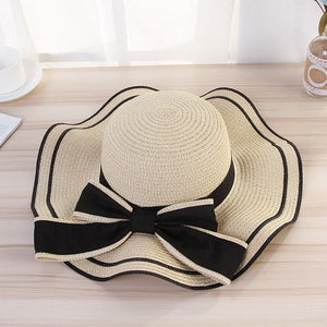 Summer wide brim hat wavy edge bow straw hat ladies beach sunshade wide brim hat manufacturers wholesale - Negative Apparel