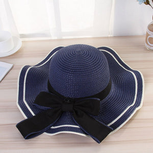 Summer wide brim hat wavy edge bow straw hat ladies beach sunshade wide brim hat manufacturers wholesale - Negative Apparel
