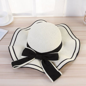 Summer wide brim hat wavy edge bow straw hat ladies beach sunshade wide brim hat manufacturers wholesale - Negative Apparel