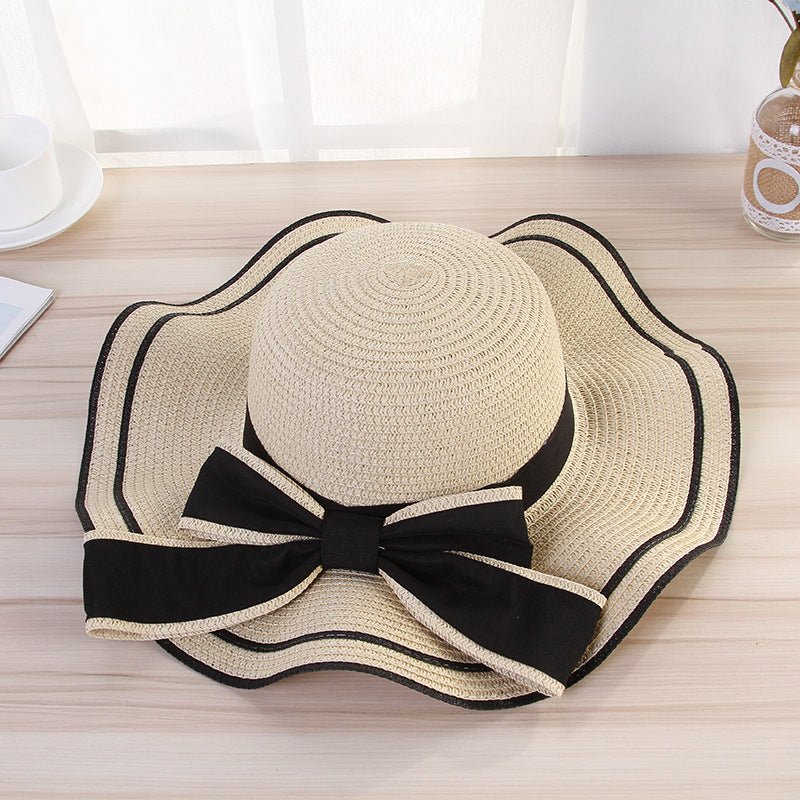 Summer wide brim hat wavy edge bow straw hat ladies beach sunshade wide brim hat manufacturers wholesale - Negative Apparel
