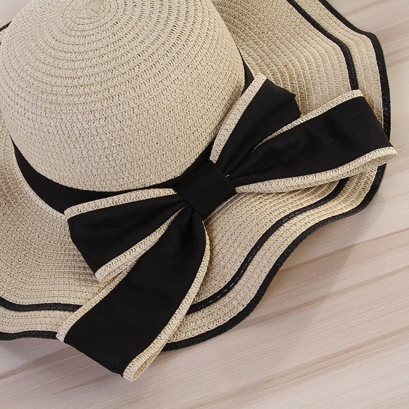 Summer wide brim hat wavy edge bow straw hat ladies beach sunshade wide brim hat manufacturers wholesale - Negative Apparel