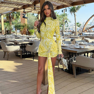 Women's long - sleeved contrasting color printing tight - fitting hip - wrapped pleated ribbon short dress - Negative Apparel